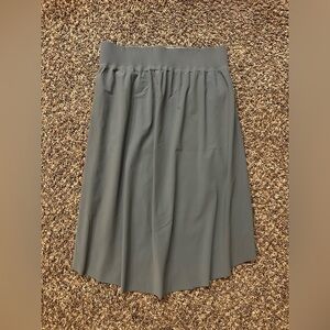 Athleta Cosmic Skirt Hi Lo Athleisure Pockets grayish/green/sage size MED
